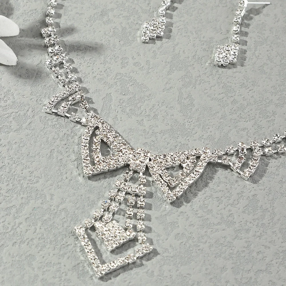 Silver Rhinestone Tie Necklace Bracelet Earrings and Ring Set - Picture 2 of 4